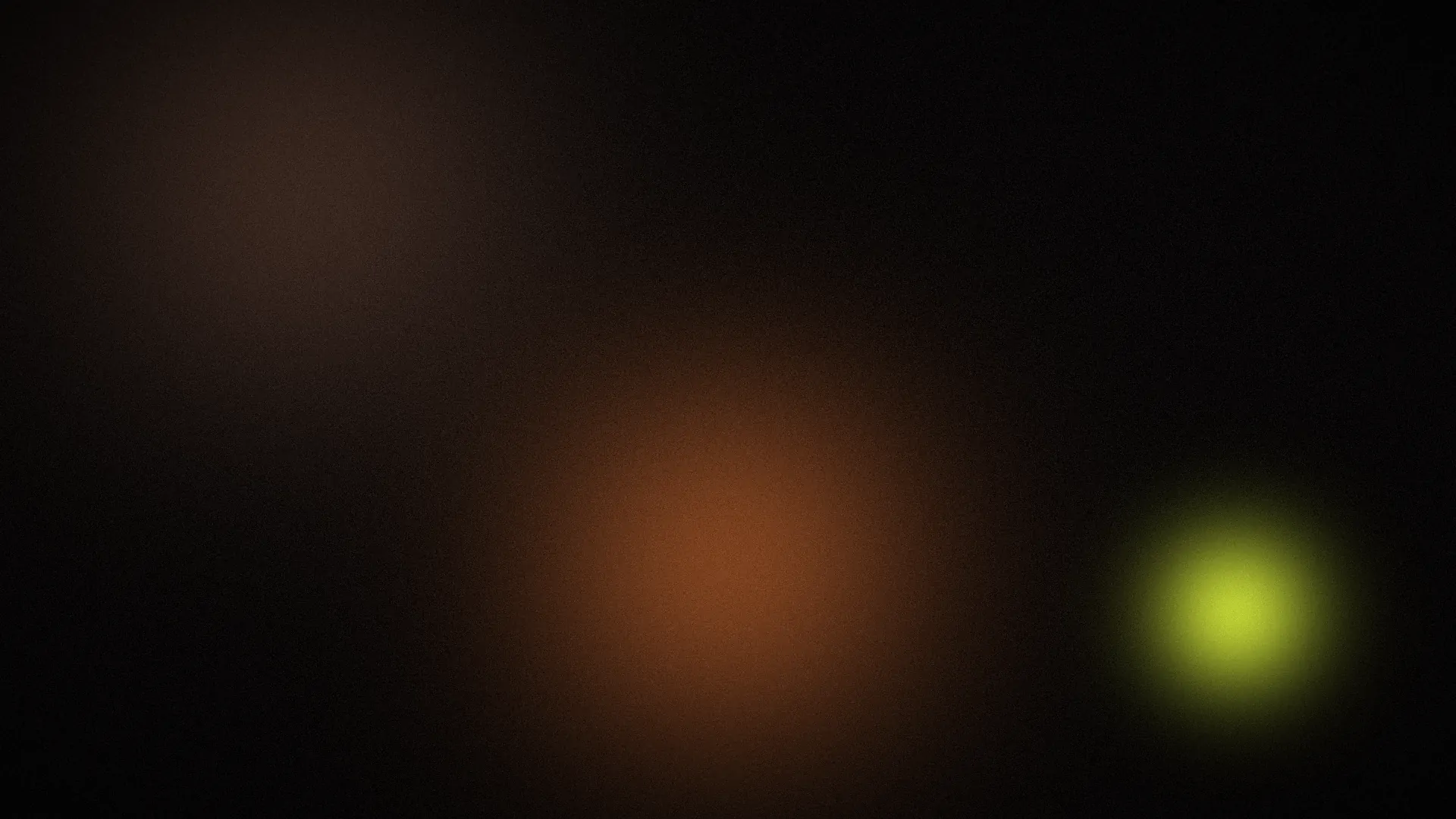 Concept illustration: amber glow and curls of steam on a black background